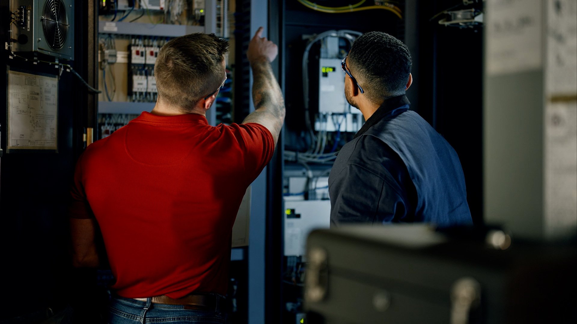 Morris engineers at electrical panel